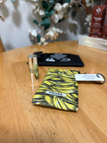 2pc Prada Bundle,MINI Lip Balm 0.04oz, U002 Banana Yellow& Limited Edition Pouch